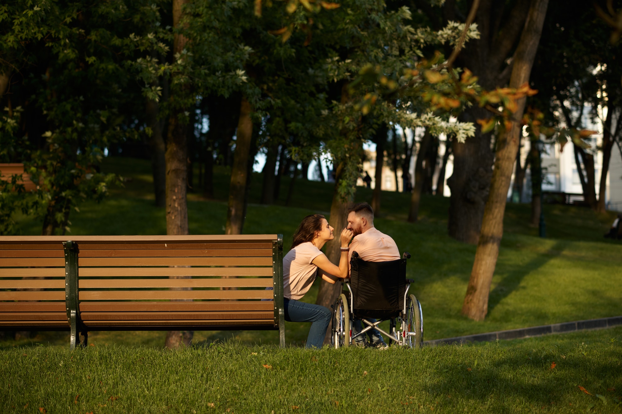 Love couple, care for disabled man in wheelchair
